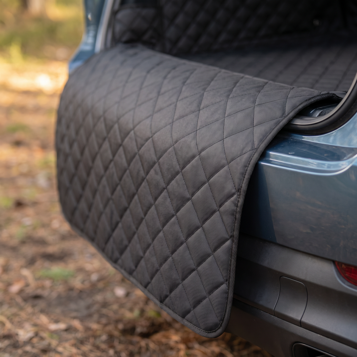 Close up of the Trailguard bumper flap over a car bumper